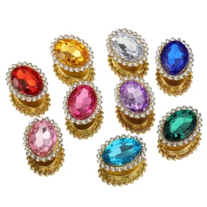 Composants de bijoux DIY en strass ovales de verre colores avec base doree et cristaux.