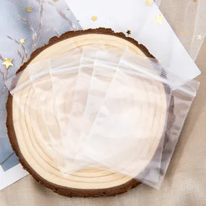 Clear PE ziplock plastic bags for jewelry packaging, resealable small storage pouches.
