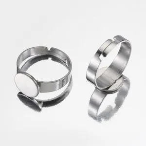 Stainless steel adjustable blank ring settings with flat pad trays for DIY jewelry crafts.