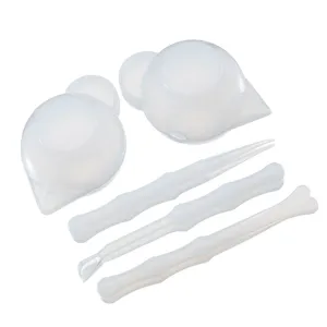 Silicone epoxy resin mixing cup and shaping tools detail view for DIY crafts making.