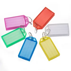 Colorful plastic keychain label tags with double split rings and flip-top paper inserts.