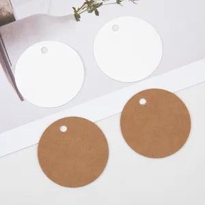 Blank round paper tags and kraft paper hang tags for DIY gift wrapping and label making.