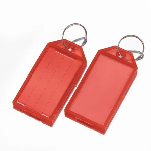Plastic key tags with split rings and label insert cards, red keychain luggage markers.