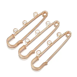 Goldene Sicherheitsnadeln mit Ösen, ideal für DIY-Schmuck und Kleidungsanpassungen.