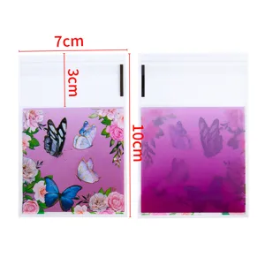 Bolsas autosellables transparentes con patrón de mariposa para joyas y caramelos de 50 piezas