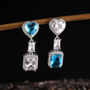 Prachtige hartvormige blauwe kristallen lange oorbellen met sprankelende zirkonia voor vrouwen.