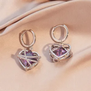 Prachtige paarse zirkoon hart creolen met uniek gesmolten lava design voor stijlvolle dames.