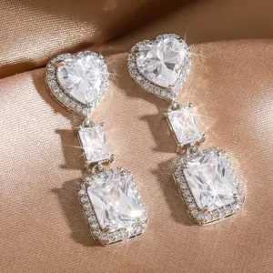 Luxe lange kristallen oorhangers met schitterende hartvormige en rechthoekige stenen.