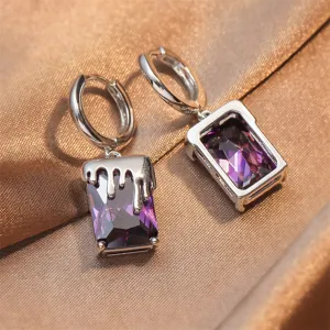 Chique paarse zirkoon oorbellen met uniek smeltend lavadesign voor een koele stijl.