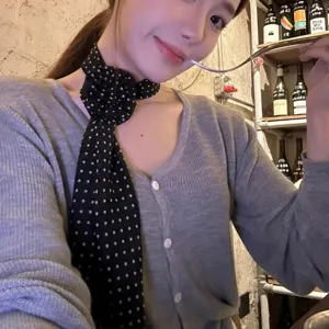 Y2K black polka dot rose ribbon scarf, trendy feminine neck accessory for stylish outfits.