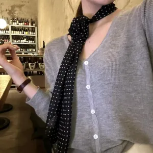 Trendy Y2K black and white polka dot scarf with rose flower ribbon accessory for women.