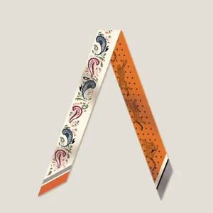Women's twill silk twilly scarf, double-sided cheetah and paisley design for handbag handle.