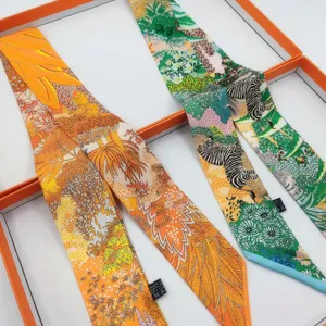 Spring long Twilly silk scarf for bag handle decoration, vibrant jungle and zebra prints.