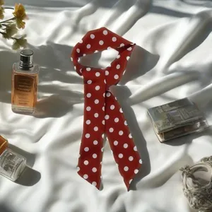 Vintage red polka dot silk twilly scarf for women, versatile hair ribbon and bag accessory.