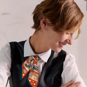 Detailed view of a stylish narrow silk scarf elegantly worn as a chic necktie accessory.