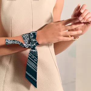 Elegant dark blue paisley skinny silk twilly scarf for wrist and bag decoration.