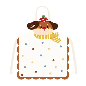 Cute cartoon dog shaped kitchen apron detail view, colorful polka dots pattern with scalloped edge.