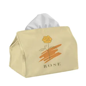Detail view of the cream ins-style fabric tissue box cover with a delicate yellow rose print.