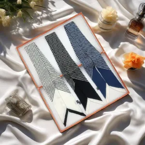 Detailed view of French vintage skinny silk scarves set, elegant striped long hair band for women.