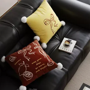 French retro style throw pillow cover with pom poms for cozy living room sofa and bed decor.