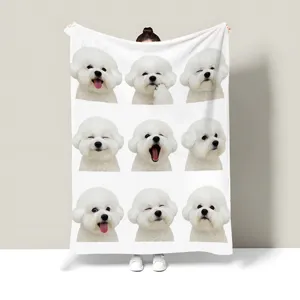 Detailed view of the custom pet photo flannel blanket featuring cute dog facial expressions.