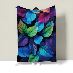 Close-up detailed view of colorful leaf flannel blanket presentation in a clean modern room