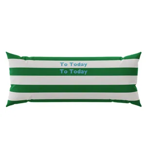 Green white striped bolster pillow detail, soft long cushion surface with blue text design.