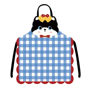 Cute cartoon cat apron detail showing blue plaid fabric, red scalloped trim, and neck strap.
