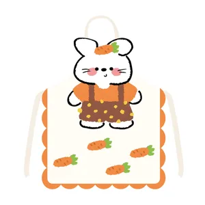 Cute cartoon rabbit pattern detail on white fabric kitchen apron, perfect for baking and cooking use.