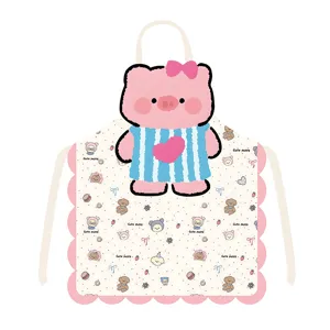 Cute cartoon animal fabric apron detailed view featuring pink pig pattern and scalloped edges.