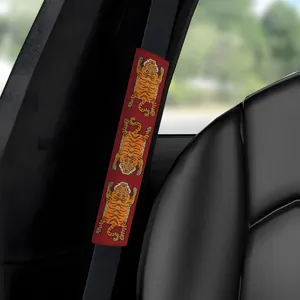 Car seat belt shoulder pad with cute tiger print, soft comfort protective cover for auto interior.