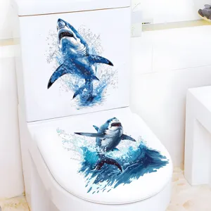 Detailed view of 3D shark toilet sticker applied on white toilet bowl, waterproof decor scene.
