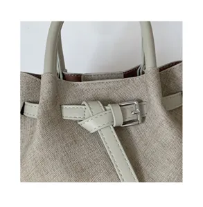 minimalist textured handbag stylish leather handle metallic buckle detail chic tote bag