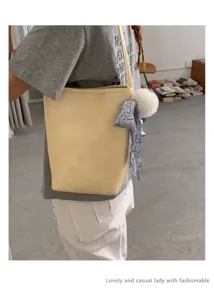 Minimalist leather bucket bag for women, chic casual single shoulder tote for summer daily use.