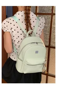 Muntgroene casual college stijl grote capaciteit rugzak met mooi gevlochten patroon.