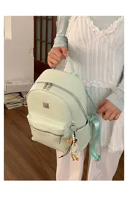 Mintgroene geweven rugzak detail, stijlvolle casual schooltas voor dagelijks gebruik.