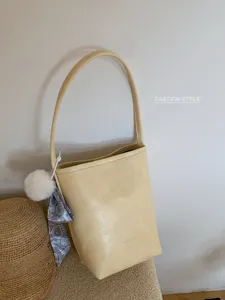 Summer minimalist bucket bag, elegant PU leather shoulder bag, versatile underarm handbag for women.