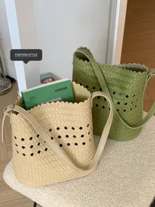 Sommer geflochtene Eimer Tasche für Damen, stilvolles hohles Design Umhängetasche für den Alltag.