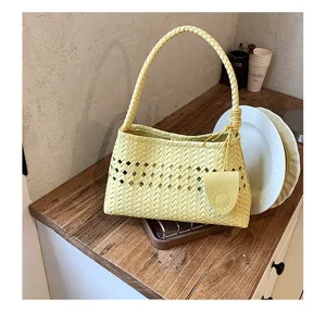 Yellow woven underarm shoulder bag for women, chic hollow out trendy casual commute handbag.