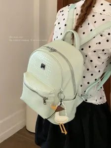 Casual mintgroene rugzak met grote capaciteit in collegestijl voor studenten dagelijks.