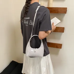 Minimalist polka dot hobo bag for women, stylish leather shoulder handbag and crossbody.