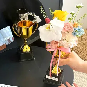 Gold trophy artificial flower arrangement DIY kit, perfect for teacher appreciation gift and home decor.