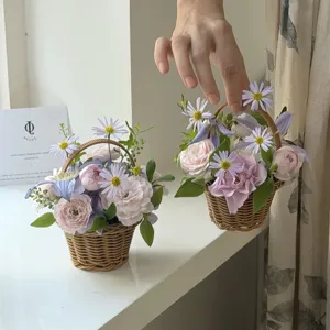 Handmade woven flower basket with cute mini floral arrangement for desktop decor and gifts.