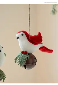 Christmas felt bird hanging decoration with brown bell and pine, perfect for holiday tree decor.