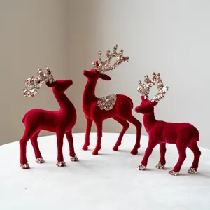Christmas red flocked deer figurines set with sequin antlers for holiday desktop decor.