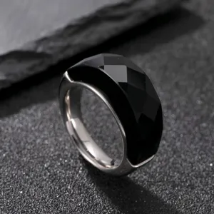 Minimalist stainless steel black faceted zircon ring, exquisite high-end jewelry detail.