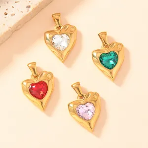 Gold-toned irregular heart pendants featuring colorful cubic zirconia stones. Fashion DIY jewelry charms.