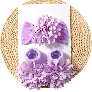 Cute baby headband and socks set with purple floral design, perfect infant two piece gift.