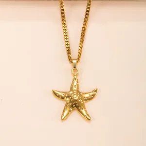 Gold stainless steel starfish pendant necklace, stylish ocean-themed jewelry for women.