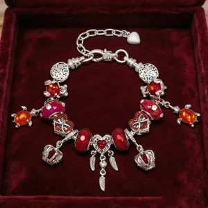 Silber Bettelarmband mit roten Perlen Herz Krone Feder Anhänger Damen Schmuck Geschenk.